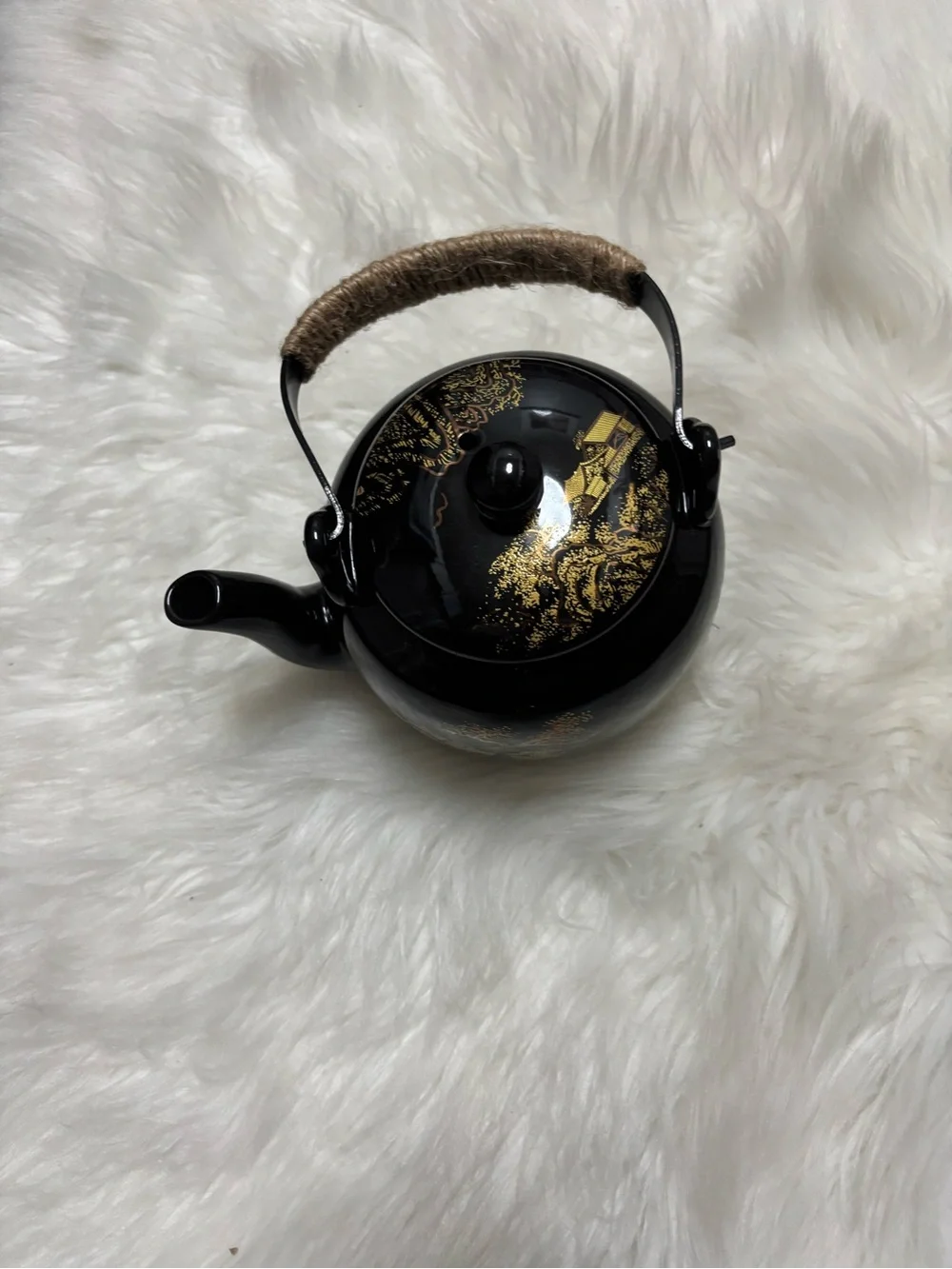 Black and Gold Ceramic Teapot with Woven Handle
